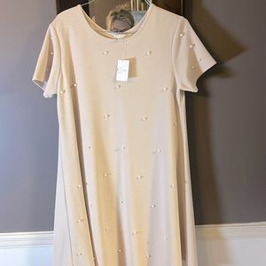 Ladies beige dress with pearls